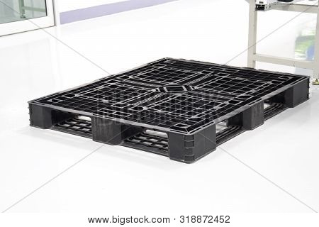 Photo Of Plastic Pallet In The Electronic Factory