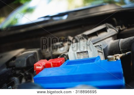 new lead-acid automotive electric battery replacement in old car