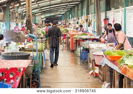 Bangkok, Thailand-sept 19th 2014. A Man Strolls Through Khlong Toei Market. It Is The Largest Wet Ma