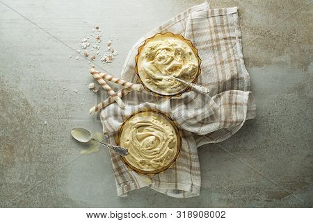 Homemade Organic Vanilla Soft Ice Cream. Vanilla Frozen Yogurt Or Soft Ice Cream In Bowl