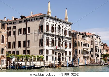 Venice, Italy - May 16, 2019:  View Across The Grand Canal Towards The Impressive Palazzo Cocana Tie