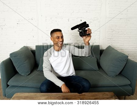 Young Happy Blogger Recording Video On Camera For Internet Blog