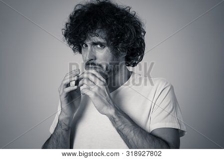Portrait Of Young Man Feeling Disgusted And Shocked At Some Violent Scene Or Smelling Or Disgusting 