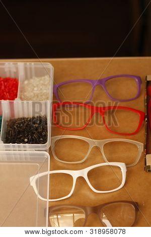 Optical Dispensing Epuipment Being Grinding Prescription Lenses In Australia
