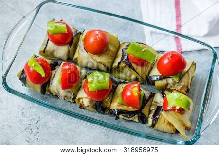 Turkish Islim Kofta Kebab With Meatballs And Cherry Tomatoes Wrapped In Eggplant / Aubergine Slices.