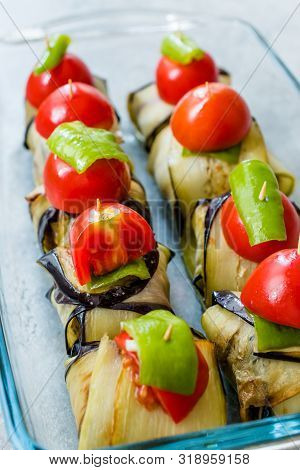 Turkish Islim Kofta Kebab With Meatballs And Cherry Tomatoes Wrapped In Eggplant / Aubergine Slices.