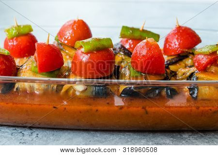 Turkish Islim Kofta Kebab With Meatballs And Cherry Tomatoes Wrapped In Eggplant / Aubergine Slices.