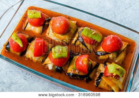 Turkish Islim Kofta Kebab With Meatballs And Cherry Tomatoes Wrapped In Eggplant / Aubergine Slices.