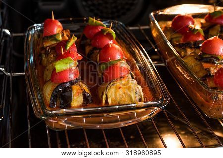 Turkish Islim Kofta Kebab With Meatballs And Cherry Tomatoes Wrapped In Eggplant / Aubergine Slices
