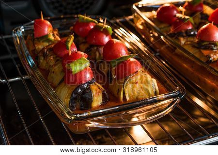 Turkish Islim Kofta Kebab With Meatballs And Cherry Tomatoes Wrapped In Eggplant / Aubergine Slices