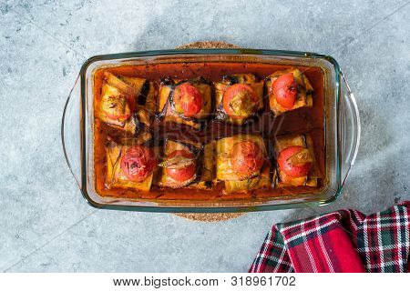 Turkish Islim Kofta Kebab With Meatballs And Cherry Tomatoes Wrapped In Eggplant / Aubergine Slices.