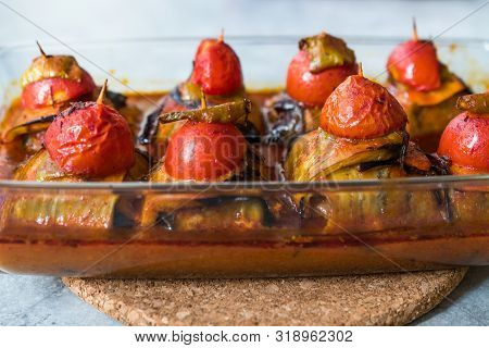 Turkish Islim Kofta Kebab With Meatballs And Cherry Tomatoes Wrapped In Eggplant / Aubergine Slices.