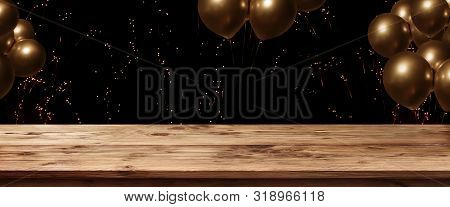 Wooden Table With Fireworks And Golden Ballons On Night Sky For A Celebrations Background