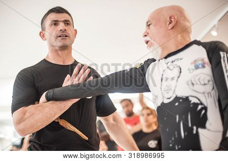 Kapap Instructor Altin Qoku, Demonstrates Disarm Techniques Against Knife Attack