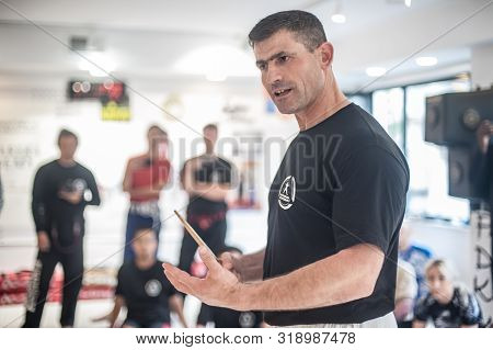 Kapap Instructor Altin Qoku, Demonstrates Disarm Techniques Against Knife Attack