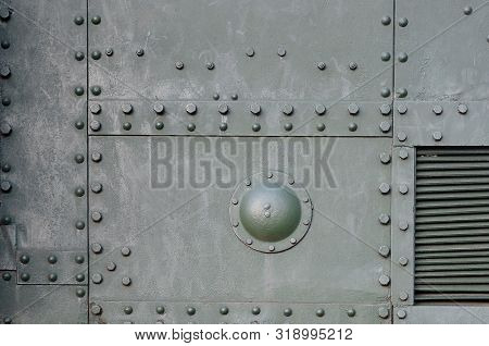 Abstract Green Industrial Metal Textured Background With Rivets And Bolts