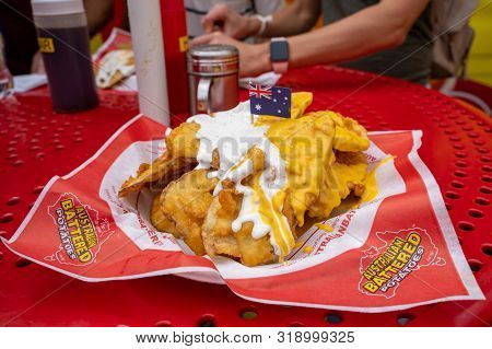 Falcon Heights, Mn - August 25, 2019: A Plate Of Austrailian Battered Potatoes On A Table At The Min