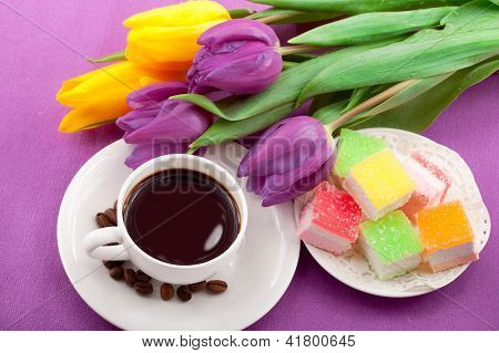 Flowers, coffee and sweets.