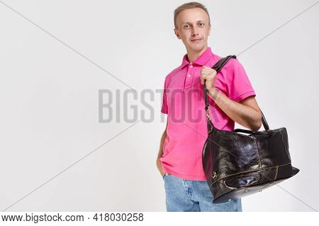 Modern Lifestyle Concepts. Portarit Of Positive Tranquil Caucasian Handsome Man Posing With Leather