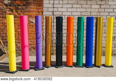 Row Of Various Colored Vinyl Car Wrapping Or Plotter Cutting Sticker Foil Film Rolls
