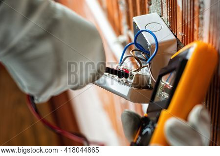 Electrician At Work On A Residential Electrical System. Electricity.