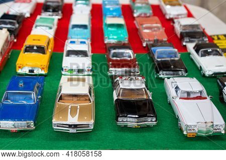 Lviv, Ukraine - March 7, 2021 - Group Of Retro Model Toy Cars - Yellow New York Taxi, Vintage Police