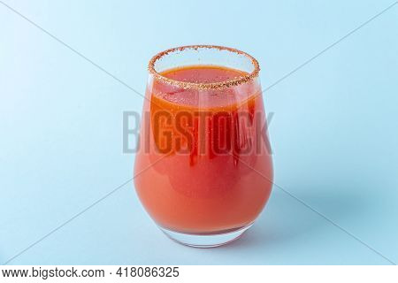 Traditional Mexican Cuisine: Alcoholic Drink Michelada. Cocktail With Tomato Juice: Bloody Mary, San