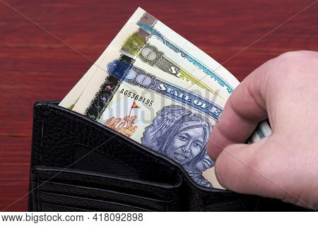 Eritrean Money - Nakfa In A Black Wallet