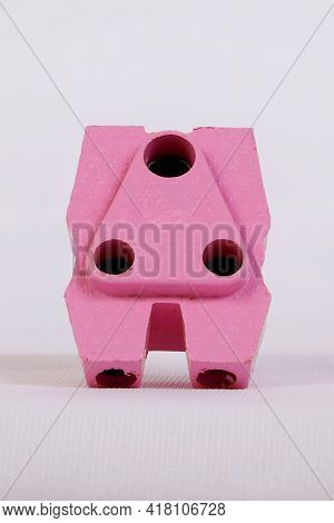 A Three Pin Socket Made Of Plastic