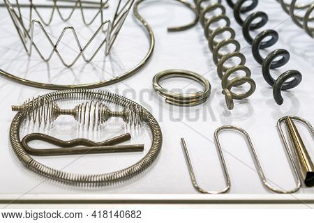 Various Types Of Sample Parts Metal Wire Bending Workpiece Such As Spring Coil Etc . After Forming M