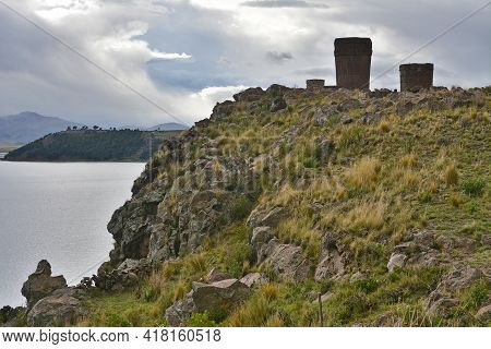 Sillustani Tombs In The Peruvian Andes Near Town Puno, Peru.\nan Inca Burial Tower At The Sillustani