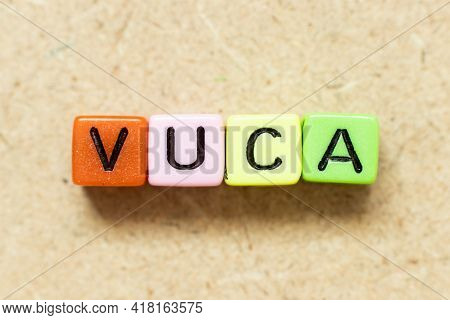 Color Alphabet Letter Block In Word Vuca (abbreviation Of Volatility, Uncertainty, Complexity And Am