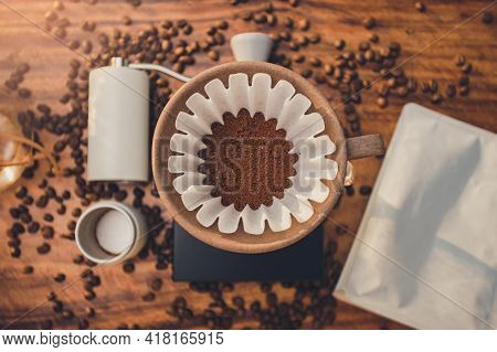 Top View Coffee Powder In The Dripper For Make Coffee Filter On Scales. Prepare Drip Coffee With Cof