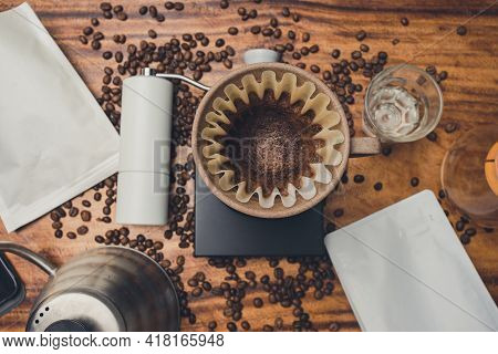 Top View Coffee Powder In The Dripper For Make Coffee Filter On Scales. Prepare Drip Coffee With Cof