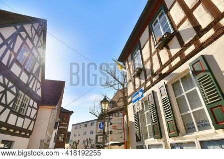 Hofheim, Germany - March 2021: Side Street With Traditional Half Timbered Buildings In Old Historic 