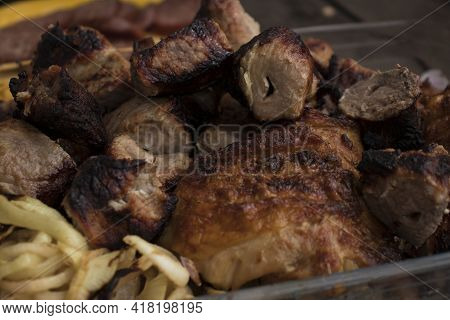 Grilled Pork Meat In A Barbecue On The Nature