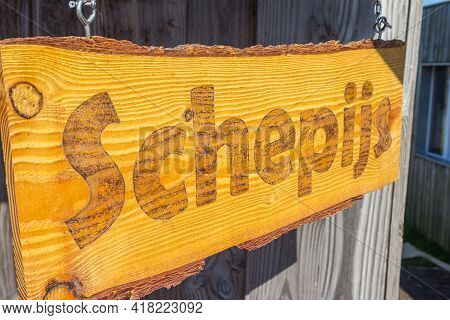 Big Wooden Sign With The Dutch Word For Ice Cream