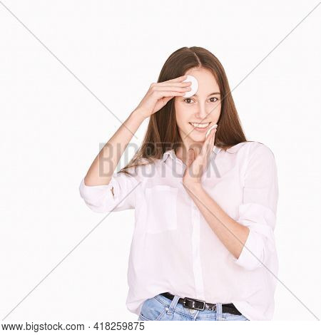 Pretty Girl Indoor Portrait. Light Background. Female Teenager Person. Long Brow Hair. Cleansing Dir