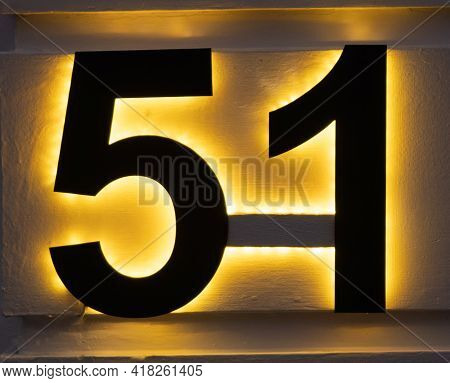 The Nimber 51 In Black With A Warm Back-light.