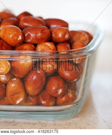 Large Amount Of Ripe Oleaster Fruits, Oleaster Fruits In A Glass Bowl,