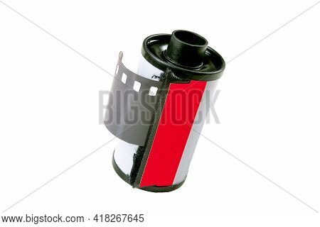 Metal Roll With Photosensitive Film. Old Black And White Film For Analog Cameras. Isolated Backgroun
