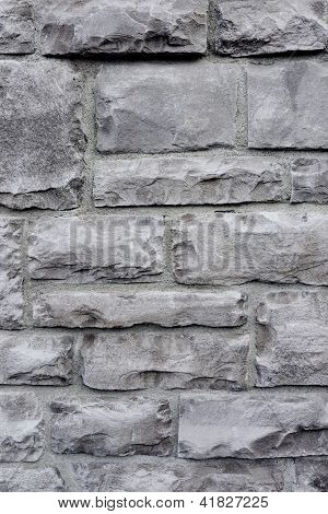 graue Backstein-Mauer-Hintergrund