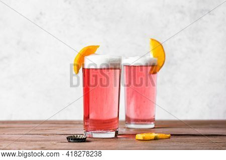 Grapefruit Or Cherry Radler, Citrus Beer Cocktail. Refreshing Fruit Beer Drink, Copy Space.