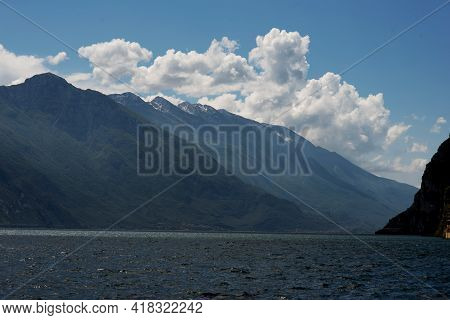 A Landscape Of Mountains With Lake, Background