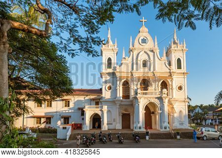 Goa, India - January 16, 2020: St. Anthony's Church at sunset in Siolim, Goa, India.