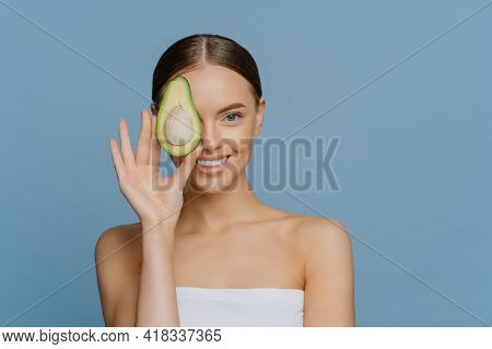 Women Skin Care Natural Cosmetics And Healthy Lifestyle Concept. Pleased Good Looking Young Woman Co