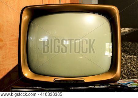 Elche, Alicante, Spain- March 28, 2021: Vintage Marconi Television And Bar Cabinet Exhibited In The 