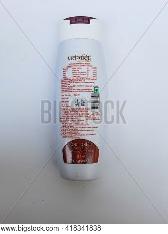 Closeup Of Patanjali Kesh Kanti Shikakai 200 Ml Plastic Container, Natural Shampoo Isolated On White