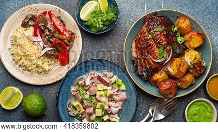Set Of Assorted Dishes Of Peruvian Cuisine: Beef And Peppers Lomo Saltado, Peruvian Ceviche With Fis