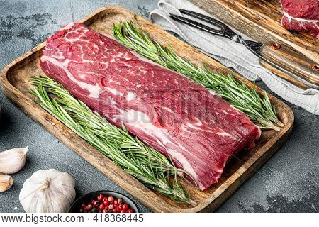 Fresh And Raw Beef Meat. Whole Piece Of Tenderloin With Steaks Set, On Gray Stone Background